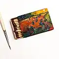 The Red Vineyards near Arles by Vincent Van Gogh painted on a matchbox
