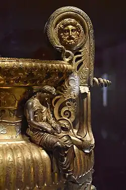 Ancient Greek medallion on a handle of the Derveni Krater, c. 370 BC, bronze and silver.[3]