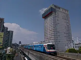 EMU-A1 at Bang Na station with BITEC behind.