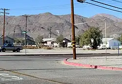 A Mountain Monogram "T" sits on the hills above Trona.