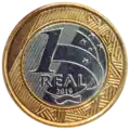 Brazilian R$1 coin, a stainless steel center in a bronze plated steel ring.