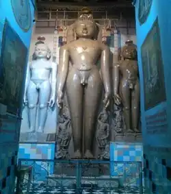 22 feet (6.7&nbsp;m) Aharji Shantinatha statue installed in 1180 CE.