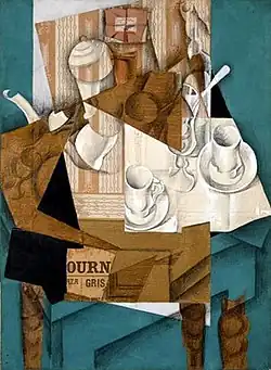 Breakfast; by Juan Gris; 1914; gouache, oil and crayon on cut-and-pasted printed paper on canvas; 80.9 x 59.7&nbsp;cm; Museum of Modern Art (New York City)[269]