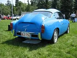 Rear of a 1959 750 GT Zagato, showing the double-bubble roof and the distinct engine lid necessary to clear the pushrod engine's upright carburetor and air cleaner