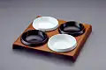Hors d'oeuvres dishes with wood base (1963)