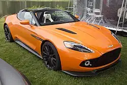 Front-three quarters view of an orange convertible