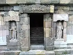 East side of main temple with portal flanked with niches containing murtis of Mahakala and Nandisvara