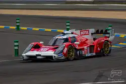 A red-and-white racing car