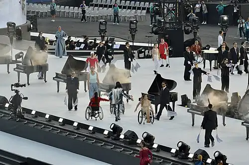 "Strict Society" and "Creative Gang" dancers with Chelsie Hill (in wheelchair)