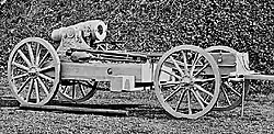A 21 cm mortar on a 4 wheeled cart.