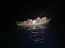 Coast Guard Cutter Escanaba (WMEC-907) interdicted this 30-foot makeshift boat with 28 migrants on board in the Mona Passage on May 21, 2019