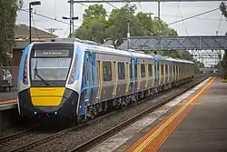 Undergoing testing, an HCMT set passes through Seddon, October 2020