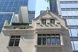 Upper stories and roof of the house