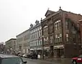 58-120 N. Main St., October 2009 [includes Granite Block at left and Pratt Opera House at right]