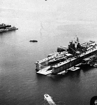 USS&nbsp;ABSD-5 at Manicani Island, Philippines repairing USS Mississippi in July 1945