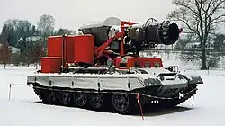 "Hurricane" firefighting vehicle, which uses the engine from a MiG-21 to blow water mist over a fire.