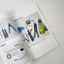 Excerpt from AdaptedDesign's guide to adapted Let's Adapt for Everyone! showing all the tools and supplies needed to switch adapt toys and devices.