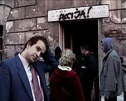 Man stands outside entrance