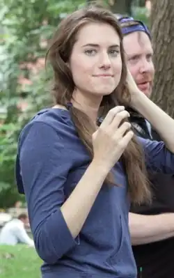 Allison Williams wearing her hair in pigtails.