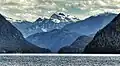 Looking northeast from Alouette Lake toward Stonerabbit Peak, Mount Ratney and Mount Bardean bunched together in the centre