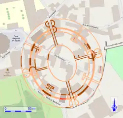 Plan montrant l'emplacement des vestiges connus d'un amphithéâtre : légende détaillée ci-dessous