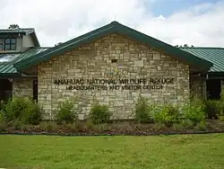 The Headquarters and Visitor’s Center, located 13 miles northwest of the refuge.