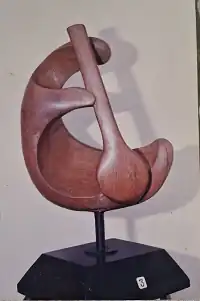 Wooden sculpture "Musician" created in 1980