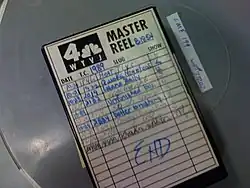 A videotape inside a cover with a cover sheet containing the WTVJ logo and various annotations