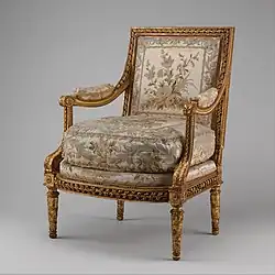 Louis XVI armchair (Fauteuil à la reine); 1780–1785; carved and gilded walnut, and embroidered silk satin; height: 102.2&nbsp;cm, width: 74.9&nbsp;cm, depth: 77.8&nbsp;cm; Metropolitan Museum of Art