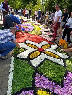 Parishioners during carpet arranging, June 2021