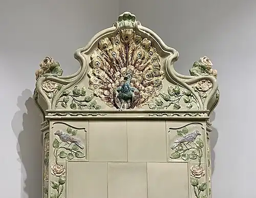 Art Nouveau acroterion of a stove in the Mița the Cyclist House (Strada Biserica Amzei no. 9), Bucharest, possibly designed by Nicolae C. Mihăescu,[10] 1908