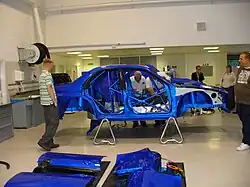 A 2006 Subaru Impreza WRC bodyshell with integrated roll cage