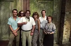 Photo by Mark Christal. Poets from Austin Poets Audio Anthology Project, Vol. II, Naked Children, left to right: Michael Vecchio, Hedwig Gorski, Phillip T. Stephens, Isabella Russell-Ides, David Wevill, Cecilia Bustamante. Stephens holds a photo of Joy Cole who had died at the time and was included on the tape.