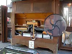 Rear of Australia Fair. Note fanfold book playing through keyframe in centre and belt drive.