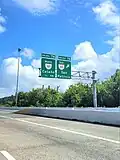 PR-22 east approaching exits 7A-B to PR-165 in Guaynabo