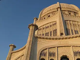 Image 30Symbols of many religions are carved in concrete relief on the exterior of the Bahá'í House of Worship in Wilmette. The temple was designed by the architect Louis Bourgeois and constructed between 1921 and 1953. Image credit: ctot_not_def (photographer), Tobias Vetter (upload) (from Portal:Illinois/Selected picture)