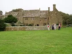 Image shows the exterior of Bailiffscourt, in its current use as a Hotel and Spa