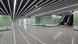 Lower paid transfer passage between the two lines