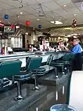 Bar seating at a Mel's Drive-In