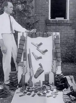 Over a dozen guns and several thousand rounds of ammunition from Bonnie Parker's shotgun, (including 100 20-round BAR magazines) were in the perforated Ford after deaths of Bonnie and Clyde.