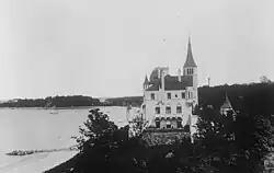 The Beacon Towers estate in 1922, showing the western elevation of the mansion. View from the Sands Point Light to Prospect Point in the background