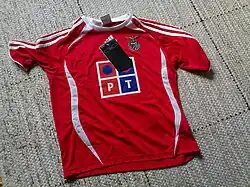 A red shirt with logos.