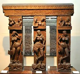 Bhutesvara Yakshis, Mathura ca. 2nd century CE. On the reverse are sculpted scenes of the life of the Buddha, wearing the monastic dress.