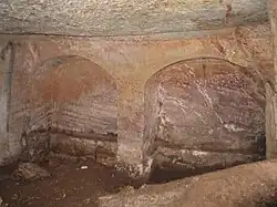 Two of the five arcosolia