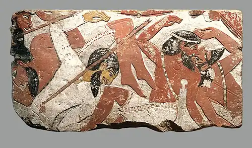 Block from a relief depicting a battle; 1427–1400&nbsp;BC; painted sandstone; height: 61.5&nbsp;cm (24.2&nbsp;in); Metropolitan Museum of Art (US)