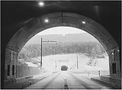 Black-and-white photo of a tunnel opening