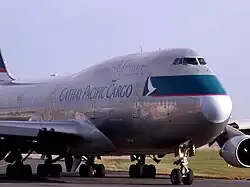 A Boeing 747-412(BCF) (B-HKS) in Silver Bullet special livery