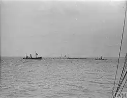 Boom defence vessels