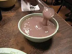 A bowl of poi, a starchy paste eaten in Eastern Polynesia.