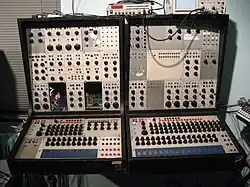One of the first commercially available analog sequencers (bottom, 3×8-step and 3×16-step) on Buchla 100 (1964/1966) [2]